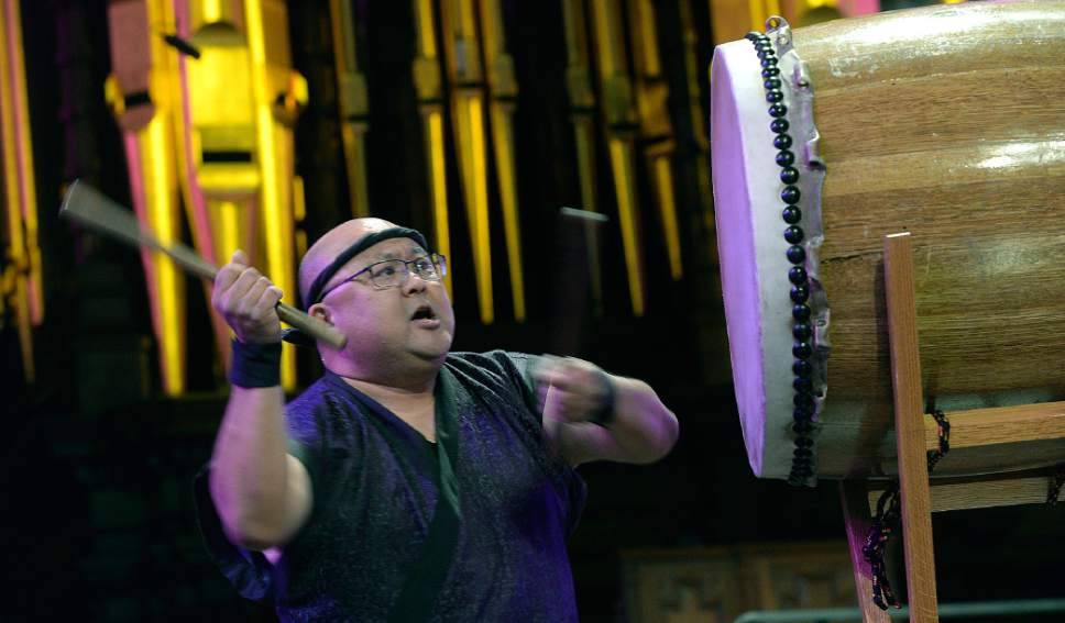 Al Hartmann  |  The Salt Lake Tribune
Taiko drummer performs with the Obi Festival Dancers at a Sacred Music Evening in the Tabernacle Sunday March 19.  It  included musical performances, dances, scripture readings, and prayers from many Utah faith traditions.
Its part of the annual Interfaith Month that's been going on every year since the 2002 Olympic Winter Games in Salt Lake City.