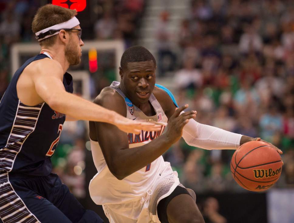 Trent Nelson  |  The Salt Lake Tribune

Arizona Wildcats guard Rawle Alkins (1) drives past St. Mary's Gaels forward Calvin Hermanson (24) in the NCAA tournament in Salt Lake City on Saturday, March 18, 2017.