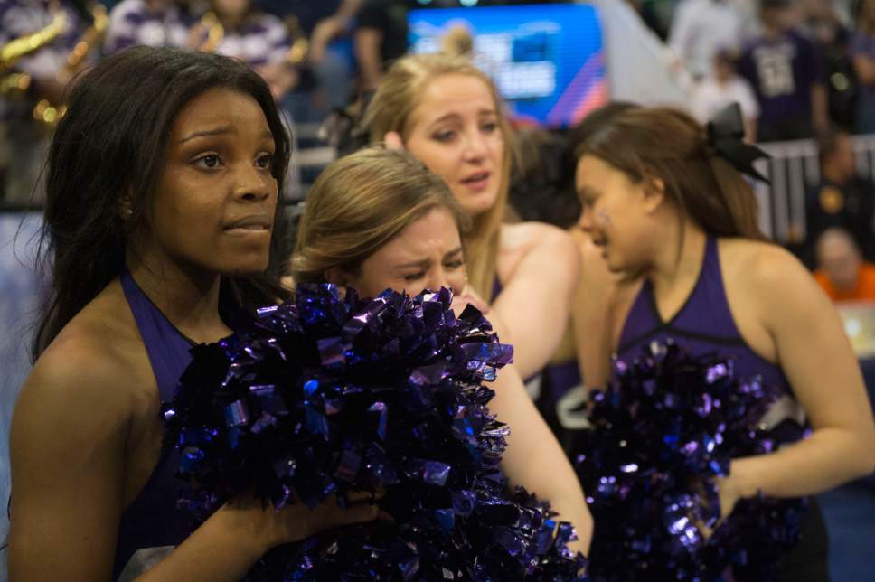 Chris Detrick  |  The Salt Lake Tribune

Northwestern cheerleaders cry after their loses to Gonzaga in the NCAA tournament in Salt Lake City on Saturday, March 18, 2017.