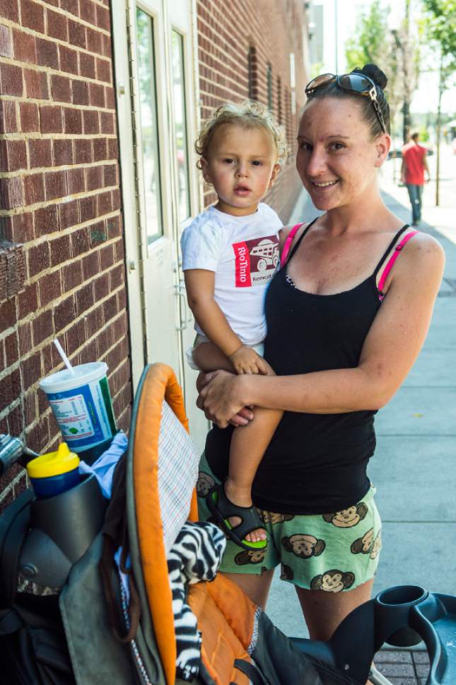 Chris Detrick  |  The Salt Lake Tribune
Eva Woodard and her son Braxtynn, 2, pose for a portrait outside of The Road Home in Salt Lake City Tuesday August 4, 2015. They having been homeless for the past two years and currently sleep at night inside of the Road Home.