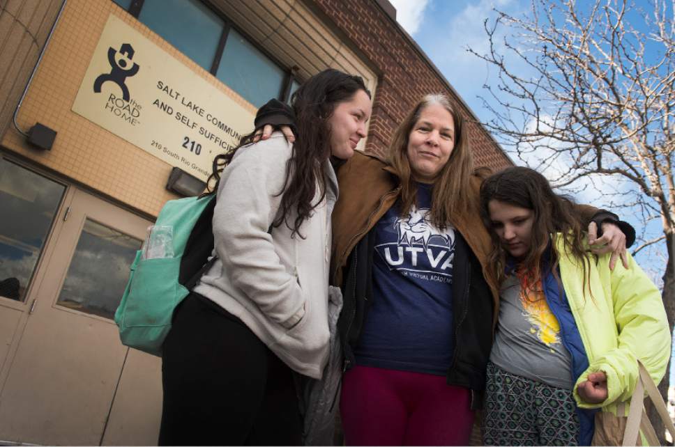 Leah Hogsten  |  The Salt Lake Tribune
Kimberly Gross and her two daughters, Petrina Westman, 14, (left) and Destiny Westman, 10, (right), are living back at The Road Home shelter after getting evicted from a Taylorsville home Gross could not afford through the shelter and its Rapid Rehousing program.