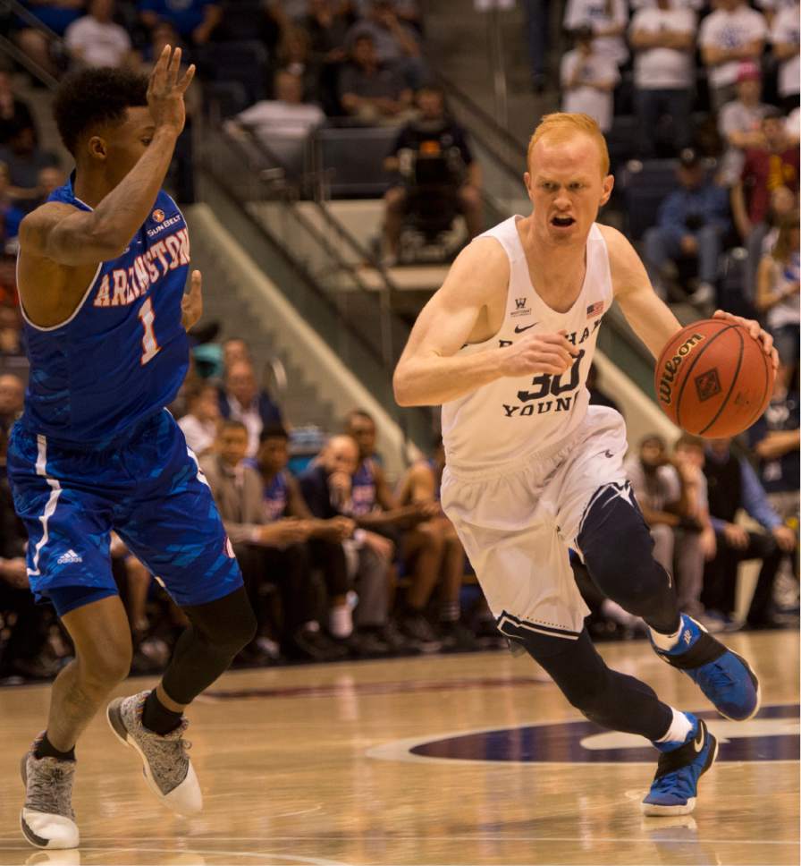 Rick Egan  |  The Salt Lake Tribune

Texas-Arlington Mavericks guard Erick Neal (1) defends as Brigham Young Cougars guard TJ Haws (30) takes the ball up the middle, in NIT basketball action Brigham Young Cougars vs. Texas-Arlington Mavericks, at the Marriott Center, Wednesday, March 15, 2017.