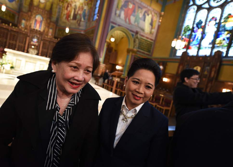 Francisco Kjolseth | The Salt Lake Tribune
Sisters Celia Solis Tapia, left, and Anggie Solis Pacubas talk about their family's love of food and humor as they join the congregation celebrating the installation of their brother Bishop Oscar A. Solis as the 10th bishop of the Diocese of Salt Lake City.