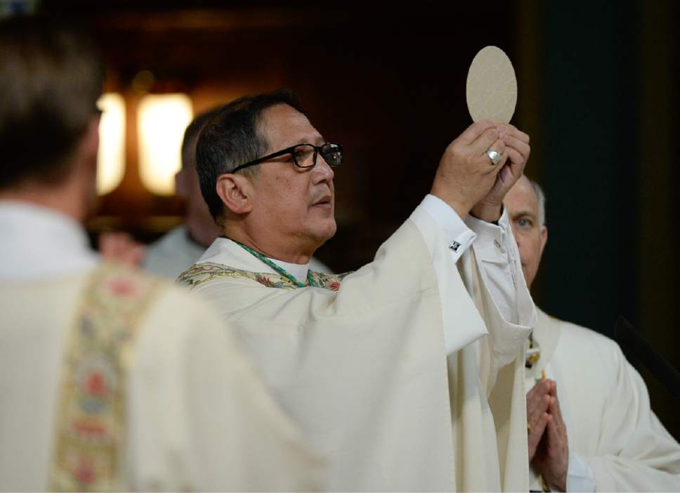Francisco Kjolseth | The Salt Lake Tribune
Bishop Oscar A. Solis celebrates communion during installation ceremony as the 10th bishop of the Diocese of Salt Lake City at the Cathedral of the Madeleine on Tuesday, March 7, 2017.