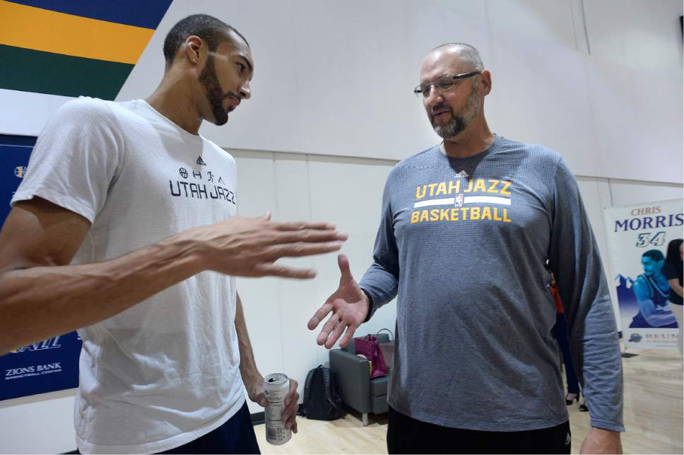 Scott Sommerdorf | The Salt Lake Tribune
Current Jazz star Rudy Gobert meets Greg Ostertag as Jazz players from the 1997 team were reunited at the Jazz practice facility, Wednesday, March 22 2017.