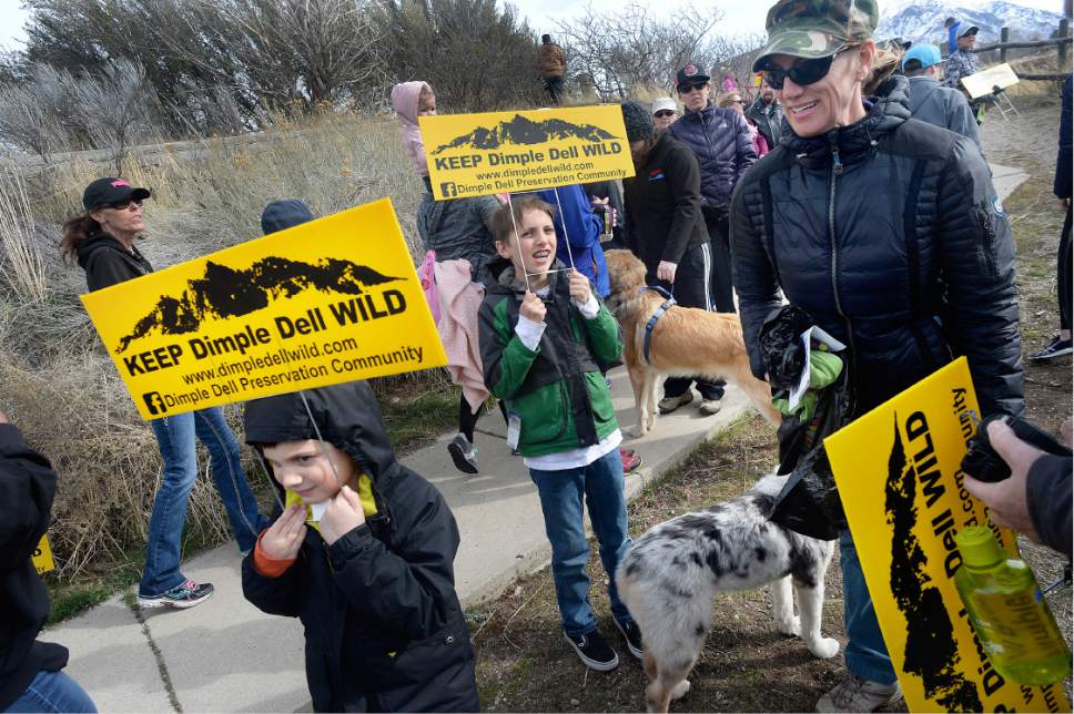 Scott Sommerdorf | Tribune file photo
Hikers prepare to walk during "March For The Park!" - an effort to work against a $4 Million 3-mile asphalt trail through Dimple Dell Regional Park in Sandy, Saturday, March 4, 2017. They are hiking east from the Wrangler Trailhead (10400 South 13000 East). The group had organized the event to support its petition effort and to inform park users of the unique characteristics found in Dimple Dell Park that it aims to preserve.