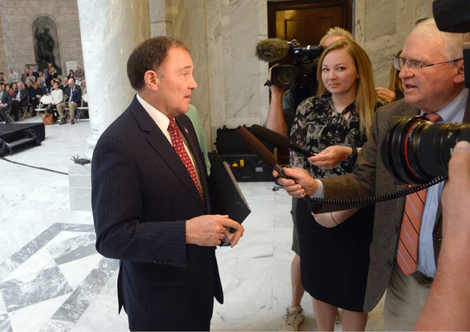 Al Hartmann  |  The Salt Lake Tribune
Gov. Gary Herbert speaks to the media Tuesday March 21 in the capitol rotunda on progress of signing and vetoing bills from this past legislative session, including the controversial DUI bill.