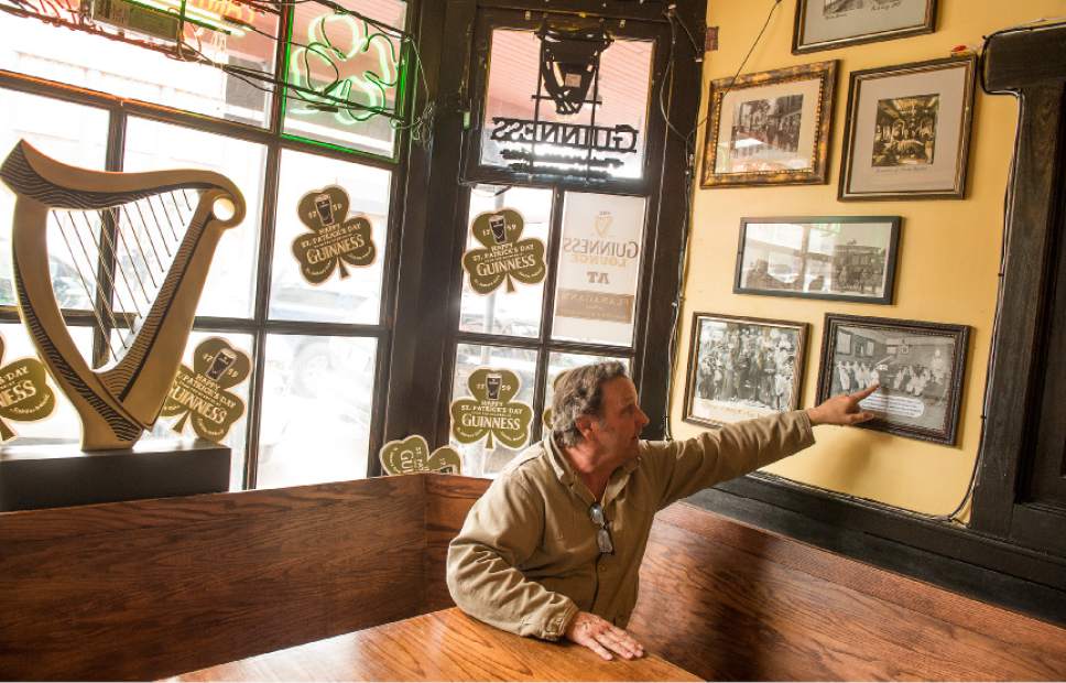 Leah Hogsten  |  The Salt Lake Tribune
Owner John Kenworthy points to his grandfather, Charles, in photos that adorn the walls of Flanagan's on Main in Park City. The  Irish pub and restaurant is named after Catholic priest, Father Edward Flanagan, who forged a father/son relationship with Kenworthy's grandfather.