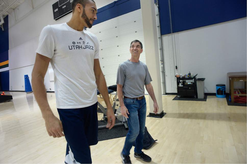 Scott Sommerdorf | The Salt Lake Tribune
Former Jazz great John Stockton looks up at current Jazz star Rudy Gobert as Jazz players from the 1997 team were reunited at the Jazz practice facility, Wednesday, March 22 2017.