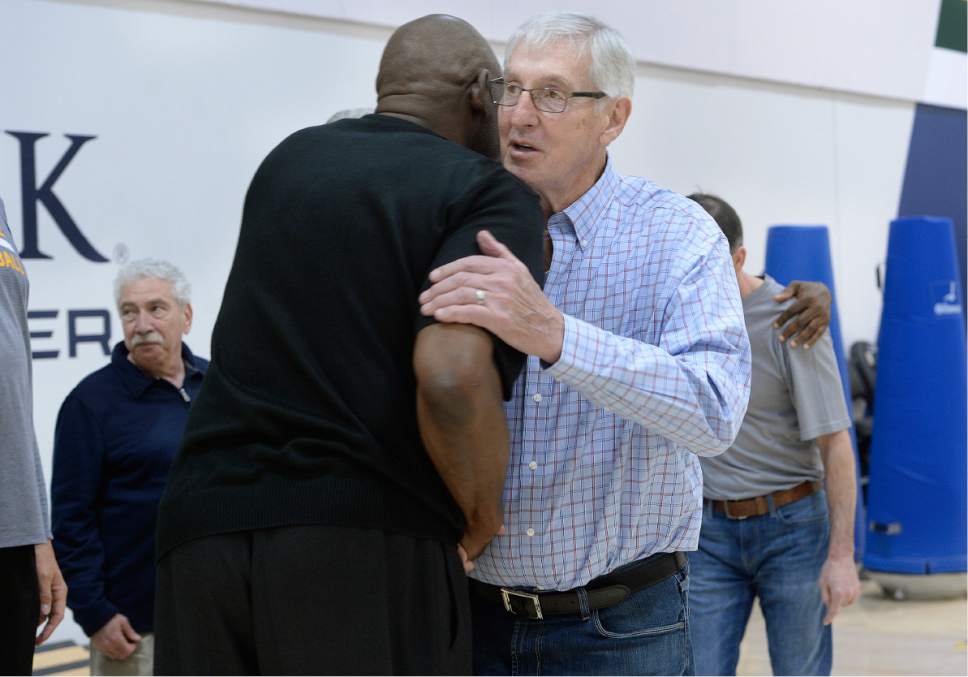 Scott Sommerdorf | The Salt Lake Tribune
Former Jazz head coach Jerry sloan hugs former Jazz player Antoine Carr as Jazz players from the 1997 team, Wednesday, March 22 2017.