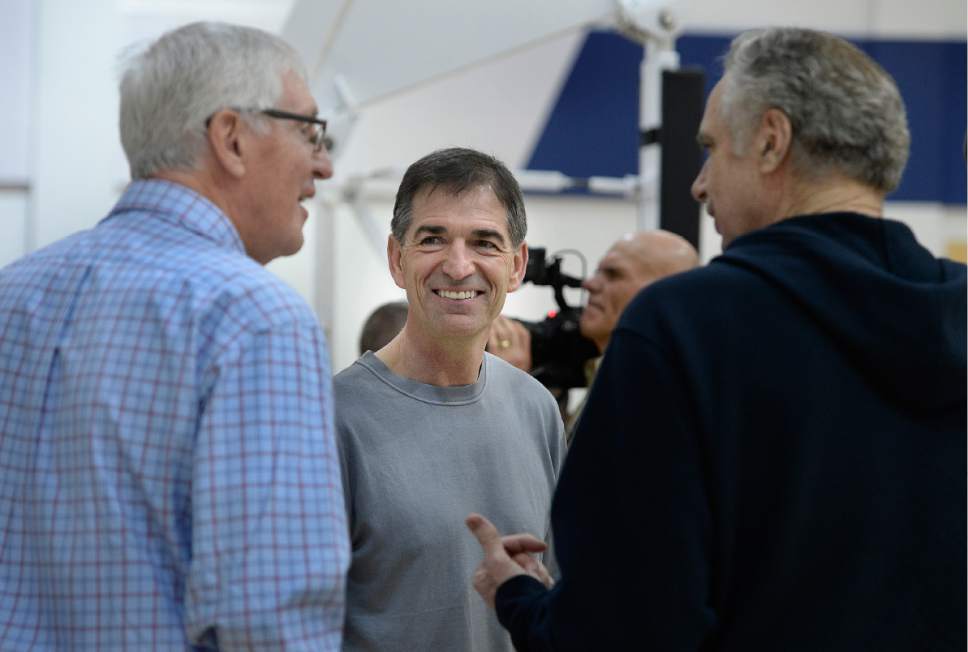 Scott Sommerdorf | The Salt Lake Tribune
Former Jazz great John Stockton, center, listens as Jazz head coach Jerry Sloan, left, jokes with Stockton and Phil Jackson, right, as Jazz players from the 1997 team had a reunion at the Jazz practice facility, Wednesday, March 22 2017.