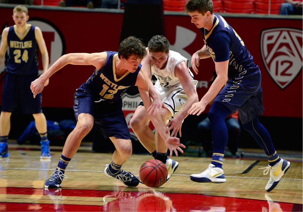 Scott Sommerdorf   |  The Salt Lake Tribune  
Westlake's Malzen Fausett battles with Stockton Shorts for a loose ball during second half play as Copper Hills beat Westlake 58-40 in a 5A semi-final played at the University of Utah, Friday, March 4, 2016.