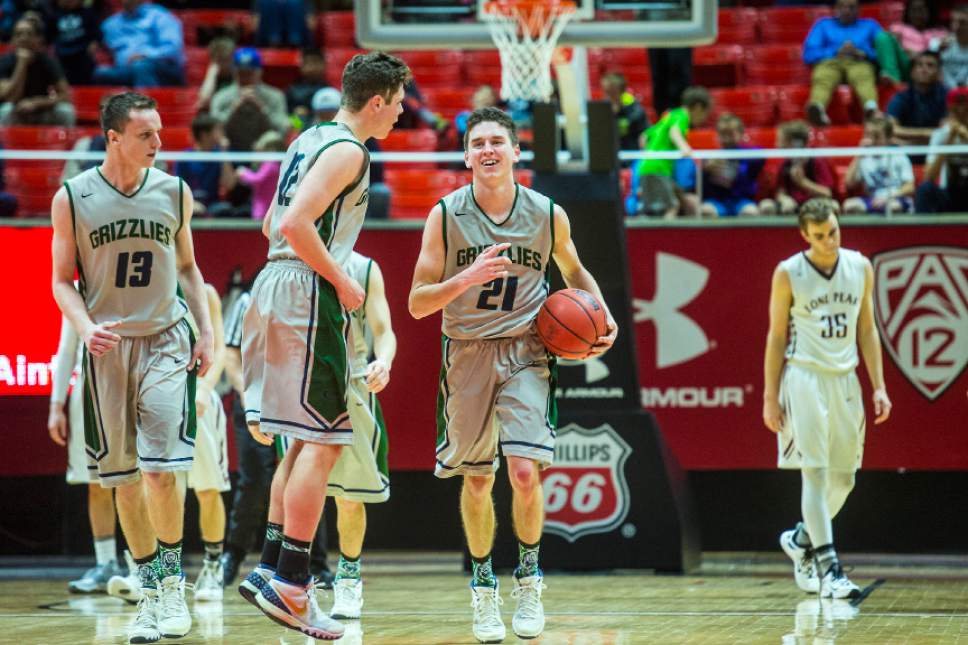 Chris Detrick  |  The Salt Lake Tribune
Copper Hills' Michael Miller (13) Copper Hills' Charles Olsen (21) and Copper Hills' Stockton Shorts (12) during the 5A boy's basketball tournament at the Huntsman Center at the University of Utah Thursday March 3, 2016. Copper Hills defeated Lone Peak 74-59.