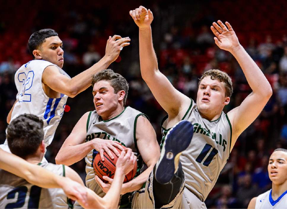 Trent Nelson  |  The Salt Lake Tribune
Bingham's Yoeli Childs (22) Copper Hills's Stockton Shorts (12) and Copper Hills's Porter Hawkins (11), as Copper Hills faces Bingham in the 5A state championship high school basketball game at the Huntsman Center in Salt Lake City, Saturday March 5, 2016.
