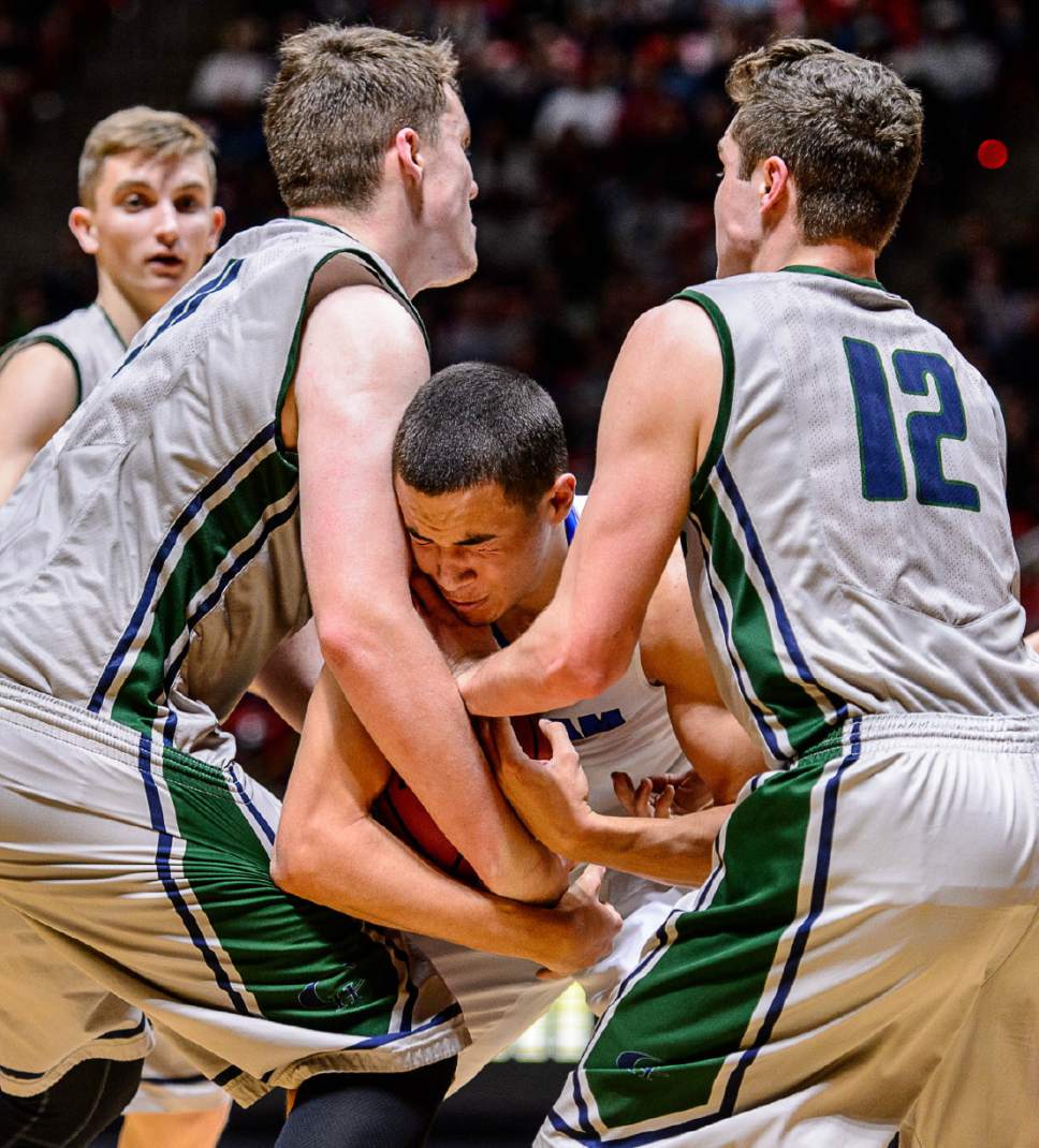 Trent Nelson  |  The Salt Lake Tribune
Copper Hills's Porter Hawkins (11) and Copper Hills's Stockton Shorts (12) double-team Bingham's Dason Youngblood (4), as Copper Hills faces Bingham in the 5A state championship high school basketball game at the Huntsman Center in Salt Lake City, Saturday March 5, 2016.