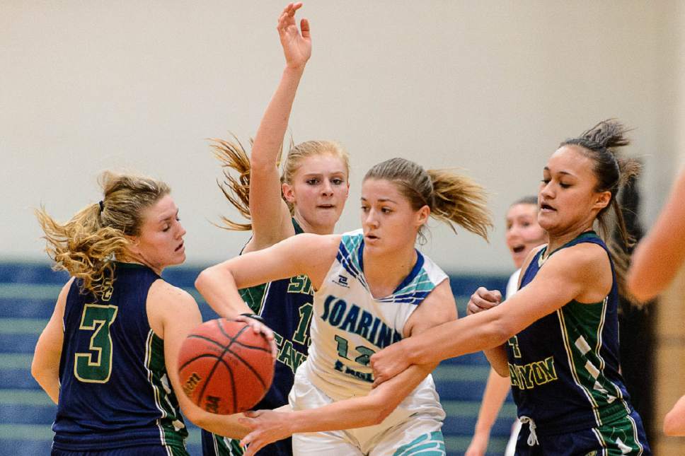 Trent Nelson  |  The Salt Lake Tribune
Juan Diego's Becca Curran passes the ball as Juan Diego hosts Snow Canyon in a 3A playoff game, girls' high school basketball in Draper, Saturday February 18, 2017.