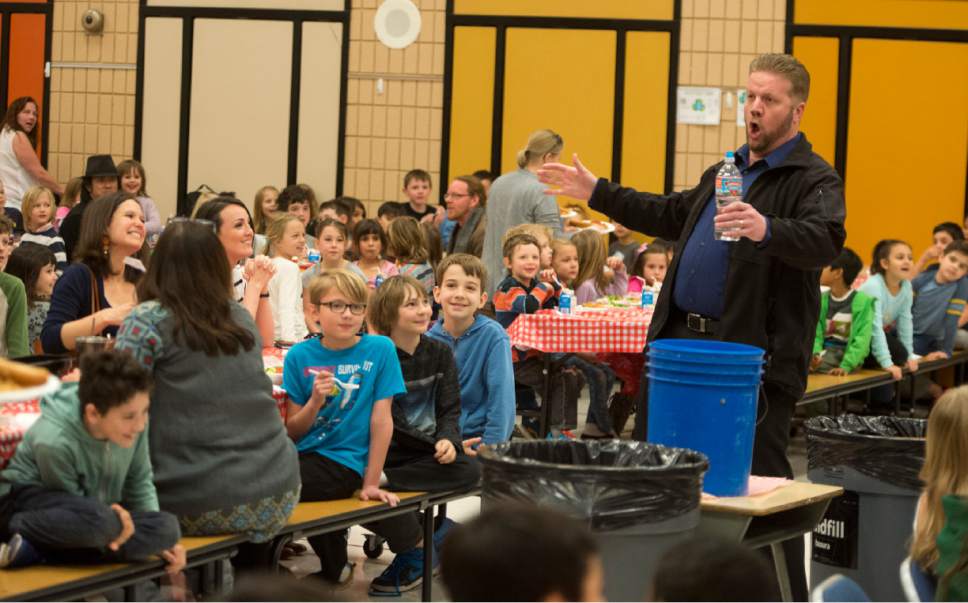 Rick Egan  |  The Salt Lake Tribune

Opera singer, Tyler Oliphant, surprises students at Wasatch Elementary School as he sings to them during a pop-up opera performance during a special "etiquette" Italian luncheon, Friday, March 24, 2017.
