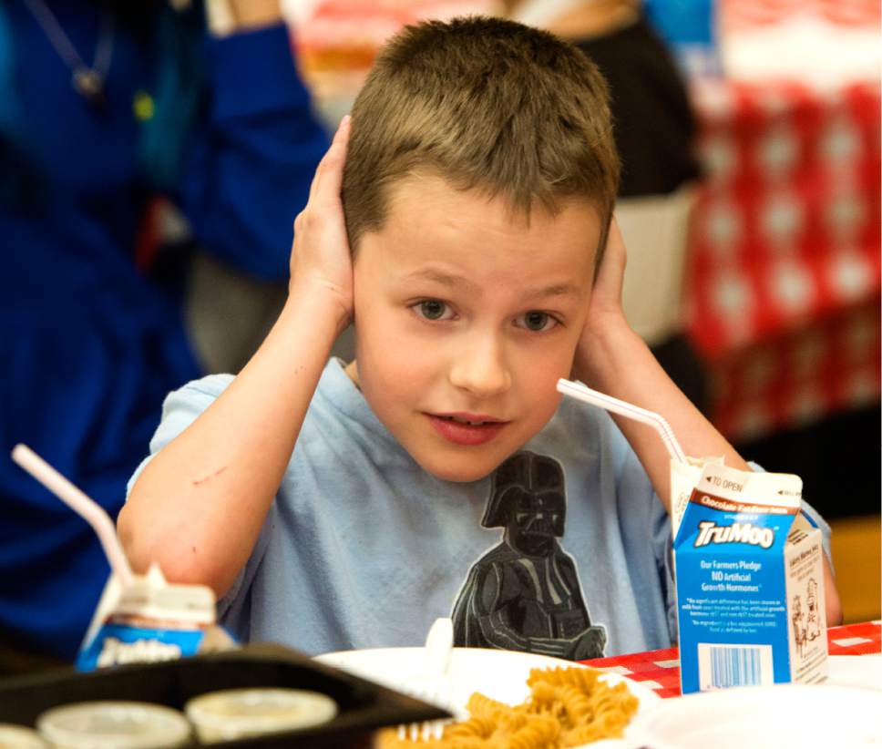 Rick Egan  |  The Salt Lake Tribune

First-grader Ryu Bott covers his ears as an opera singer hits the high notes, during a pop-up opera, at Wasatch Elementary School during a special "etiquette" Italian luncheon, Friday, March 24, 2017.