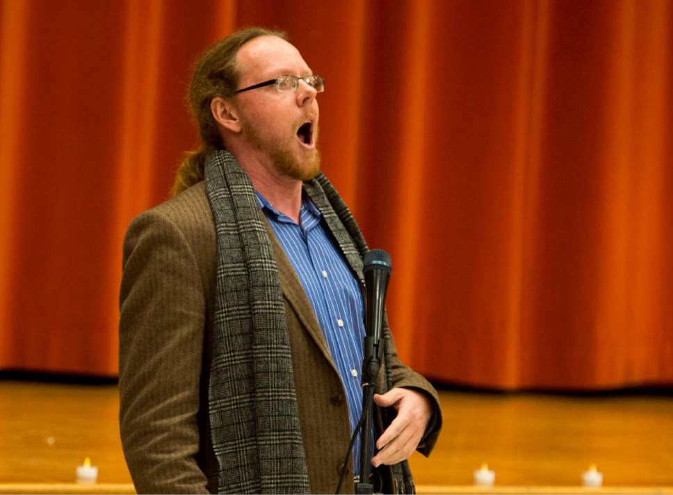 Rick Egan  |  The Salt Lake Tribune

Opera singer Anthony Buck sings to students at Wasatch Elementary School during a pop-up opera, at a special "etiquette" Italian luncheon, Friday, March 24, 2017.