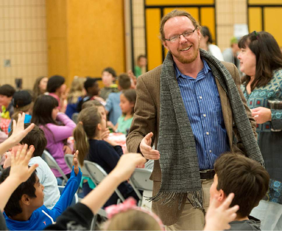 Rick Egan  |  The Salt Lake Tribune

Opera singer Anthony Buck greets students  at Wasatch Elementary School after singing to them during a pop-up opera, Friday, March 24, 2017.