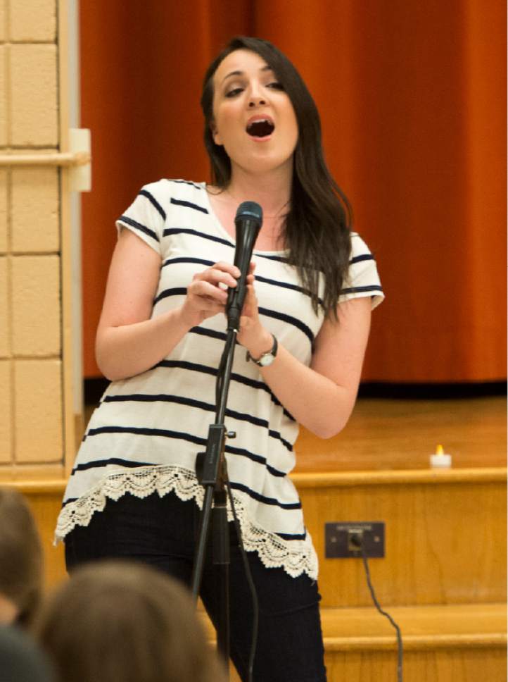 Rick Egan  |  The Salt Lake Tribune

Opera singer Julie Barker sings to students at Wasatch Elementary School in Salt Lake City during a pop-up opera, Friday, March 24, 2017.