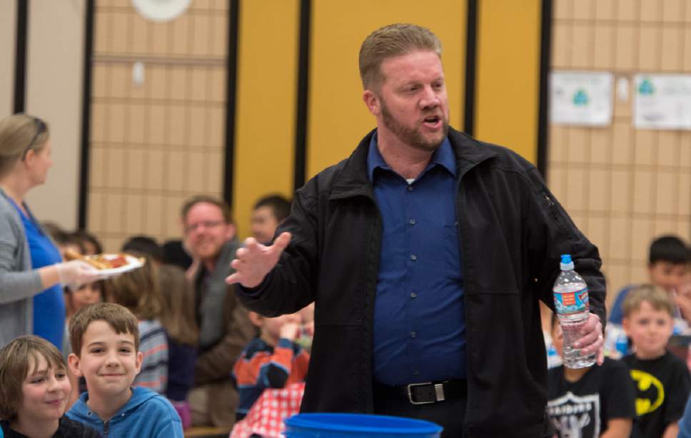 Rick Egan  |  The Salt Lake Tribune

Opera singer, Tyler Oliphant, surprises students at Wasatch Elementary School in Salt Lake City as he sings to them during a pop-up opera performance during a special "etiquette" Italian luncheon, Friday, March 24, 2017.