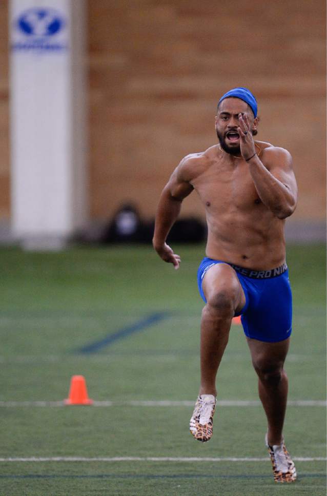 Francisco Kjolseth | The Salt Lake Tribune
Linebacker Harvey Langi pushes through the 40-yards run as BYU's Pro Day kicks off at the indoor practice facility in front of NFL scouts.
