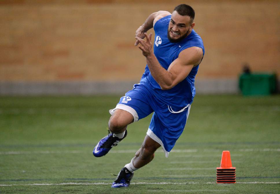 Francisco Kjolseth | The Salt Lake Tribune
Defensive Linebacker Sae Tautu pushes through drills as BYU's Pro Day kicks off at the indoor practice facility with seniors performing in front of NFL scouts.