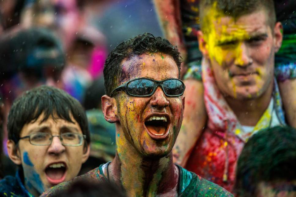 Chris Detrick  |  The Salt Lake Tribune
Revelers at the Holi Krishna Festival of Colors  dance at the Krishna Temple in Spanish Fork, Utah Saturday March 25, 2017.  One of the most important Hindu holidays of the year, it is a celebration to rejoice in the coming of spring and in the victory of good over evil.