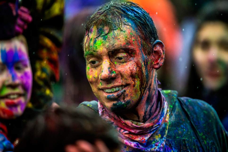 Chris Detrick  |  The Salt Lake Tribune
Revelers at the Holi Krishna Festival of Colors  dance at the Krishna Temple in Spanish Fork, Utah Saturday March 25, 2017.  One of the most important Hindu holidays of the year, it is a celebration to rejoice in the coming of spring and in the victory of good over evil.