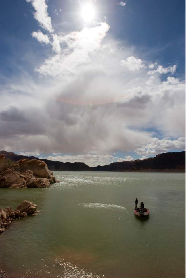 Al Hartmann  |  The Salt Lake Tribune
Threatening clouds build over Good Hope Bay for afternoon fishermen.