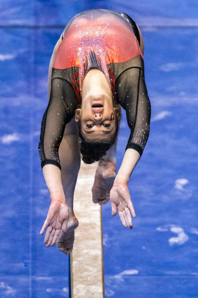 Chris Detrick  |  The Salt Lake Tribune
Utah's Baely Rowe on the beam during the gymnastics meet against Brigham Young University at the Marriott Center Friday January 13, 2017.