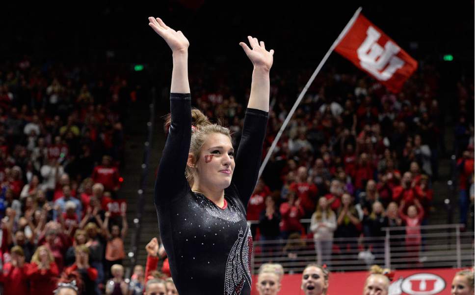 Scott Sommerdorf | The Salt Lake Tribune
Baely Rowe celebrates her 9.975 floor routine as Utah outscored Stanford 197.500 to 196.275, Friday, March 3, 2017. Rowe won the overall title with a cumulative score of 39.650.