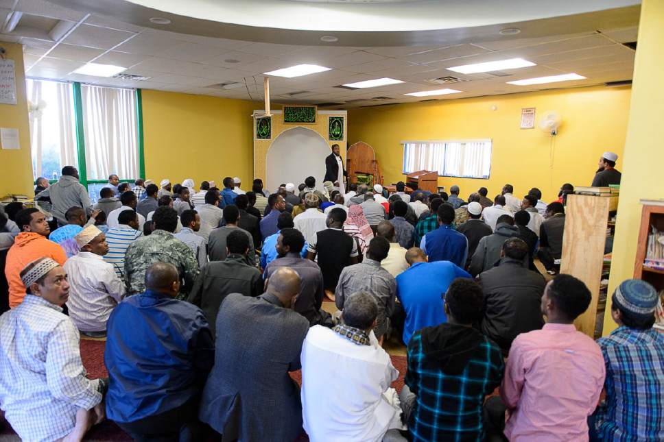 Trent Nelson  |  The Salt Lake Tribune
Imam Yussuf Abdi speaks to men gathered for Friday prayers at Madina Masjid Islamic Center in Salt Lake City, Friday March 10, 2017. Religious and community leaders gathered at the center in support of their Muslim Brothers and Sisters, regarding ICE activities and the detention of a Kenyan couple.