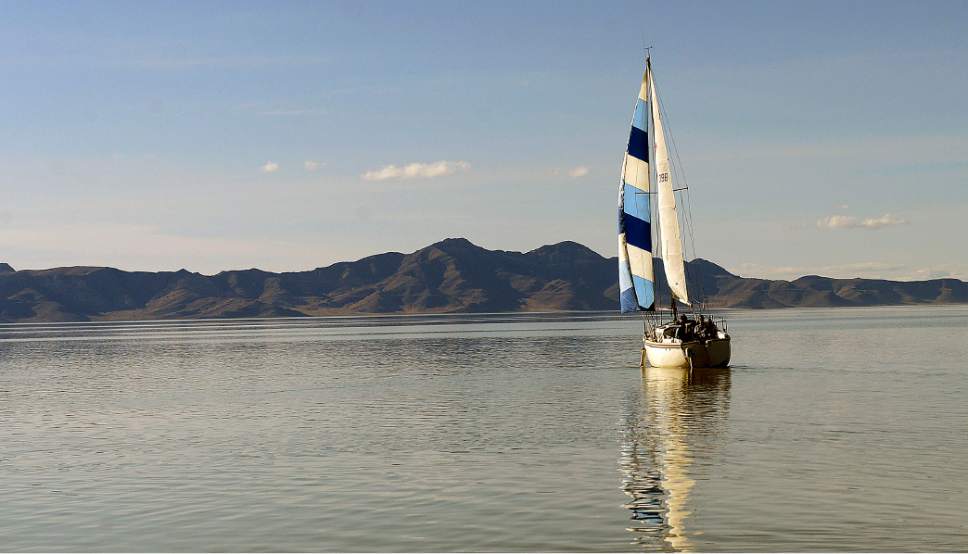 Al Hartmann  |  The Salt Lake Tribune
Sailboat takes a trip on the Great Salt Lake Wednesday March 8.  What was a common scene a few years ago is  rare as most sailboats at the Great Salt Lake Marina at Great Salt Lake State Park can no longer leave the shallow harbor and through the inlet into the lake.  Dredging of the harbor and inlet has started and with a rising Great Salt Lake helping should allow bigger sailboats to eventually come back to the lake.
