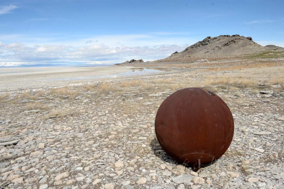 Al Hartmann  |  The Salt Lake Tribune
Old buoy (possibly from the high water mark of the mid 1980's) is a mile from the water of the Great Salt Lake on the shore of Gunnison Island.  Utah Division of Wildlife Rescources, University of Utah and Westminster College scientists visited the Island in the northwest corner of the Great Salt Lake Wednesday March 10.  The group did field research and installed cameras to understand how dropping lake levels affect the pelican population.