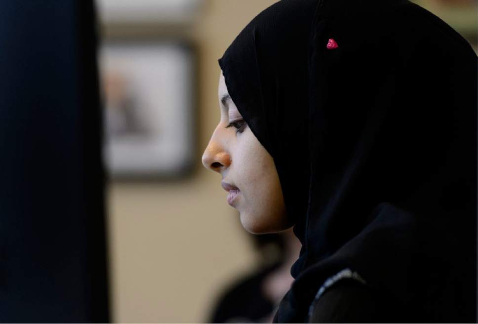 Steve Griffin  |  The Salt Lake Tribune
Takwa Sharif, 26, a part-time administrative assistant at Women of the World, a non-profit that seeks to help refugees, works at her desk in Salt Lake City earlier this month.