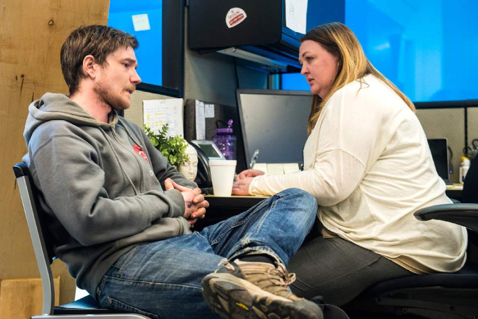 Chris Detrick  |  The Salt Lake Tribune
Case Manager Debbie Davis talks with Eric Bird at the Community Connection Center in Salt Lake City Tuesday February 14, 2017.