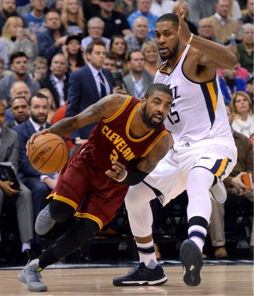 Steve Griffin / The Salt Lake Tribune

Cleveland Cavaliers guard Kyrie Irving (2) drives around Utah Jazz forward Derrick Favors (15) during the Utah Jazz versus Cleveland Cavaliers NBA basketball game at Vivint Smart Home Arena in Salt Lake City Tuesday January 10, 2017.
