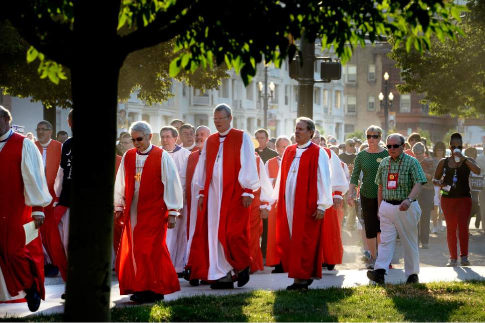 Scott Sommerdorf   |  The Salt Lake Tribune
More than 60 Episcopal bishops and and about 2,000 in all march toward Pioneer Park to protest against gun violence, Sunday, June 28, 2015. They later returned to the Salt Palace, site of the General Convention of the Episcopal Church.
