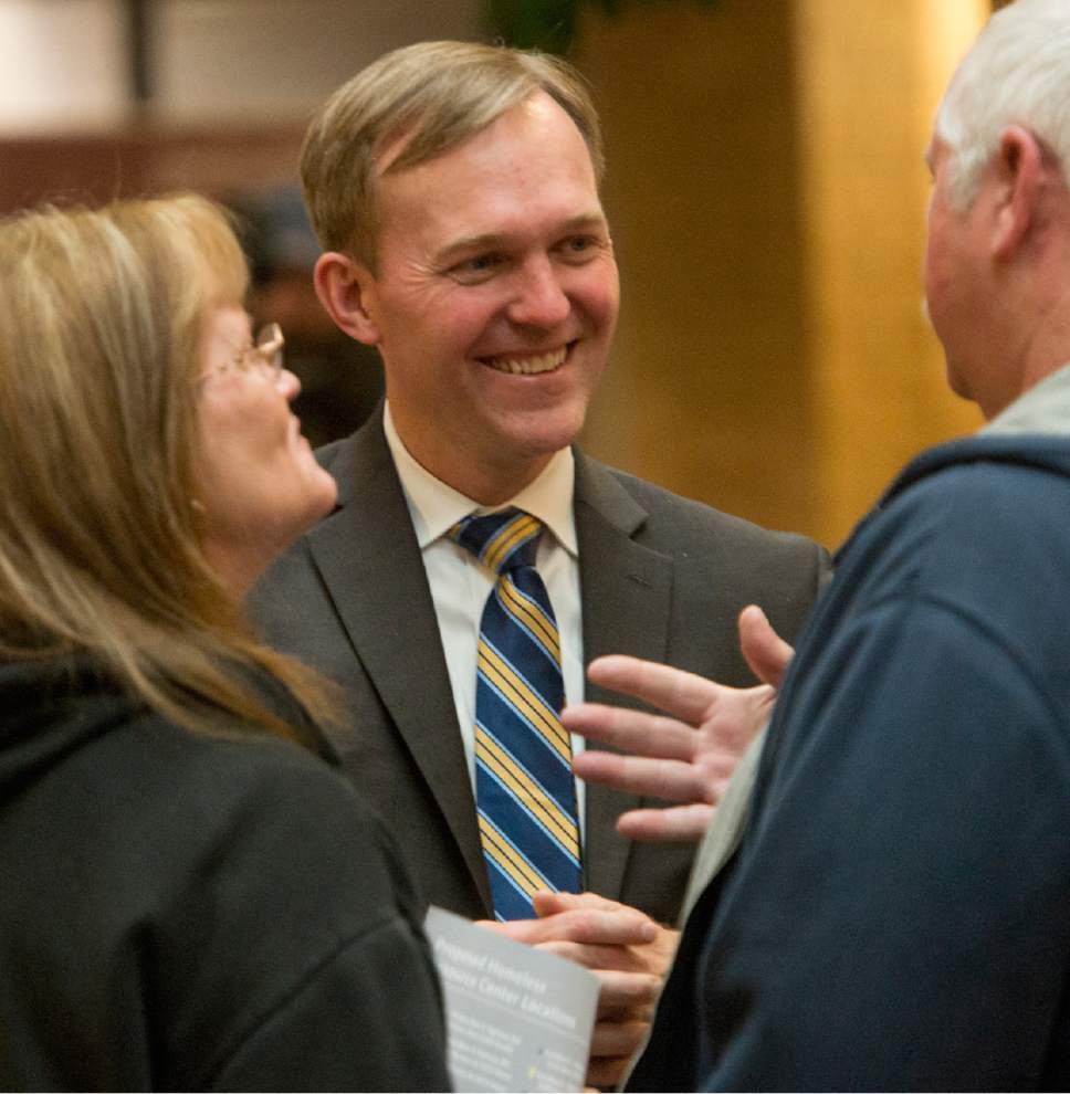 Rick Egan  |  The Salt Lake Tribune

Salt Lake County Mayor Ben McAdams visits with concerned citizens, during the final open house, hosted by Salt Lake County officials at the Salt Lake County Gov't Center, for a discussion about the two newly proposed shelter sites, 
Monday, March 27, 2017.