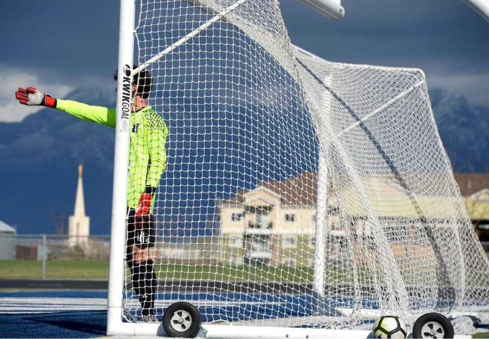 Steve Griffin  |  The Salt Lake Tribune


Bingham goal keeper Zachary Rothey directs traffic during a free kick in game against Brighton at Bingham High School in South Jordan Tuesday March 28, 2017.