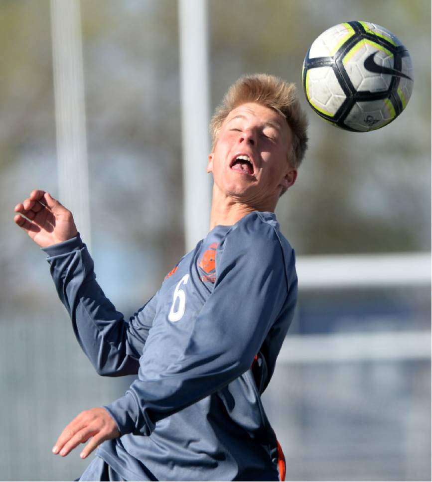 Steve Griffin  |  The Salt Lake Tribune


Brighton's Alex Pasmann spins around as he heads the ball during game against Bingham at Bingham High School in South Jordan Tuesday March 28, 2017.