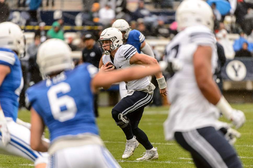 Trent Nelson  |  The Salt Lake Tribune
BYU quarterback Beau Hoge runs during the annual spring football scrimmage in Provo, Saturday March 25, 2017.