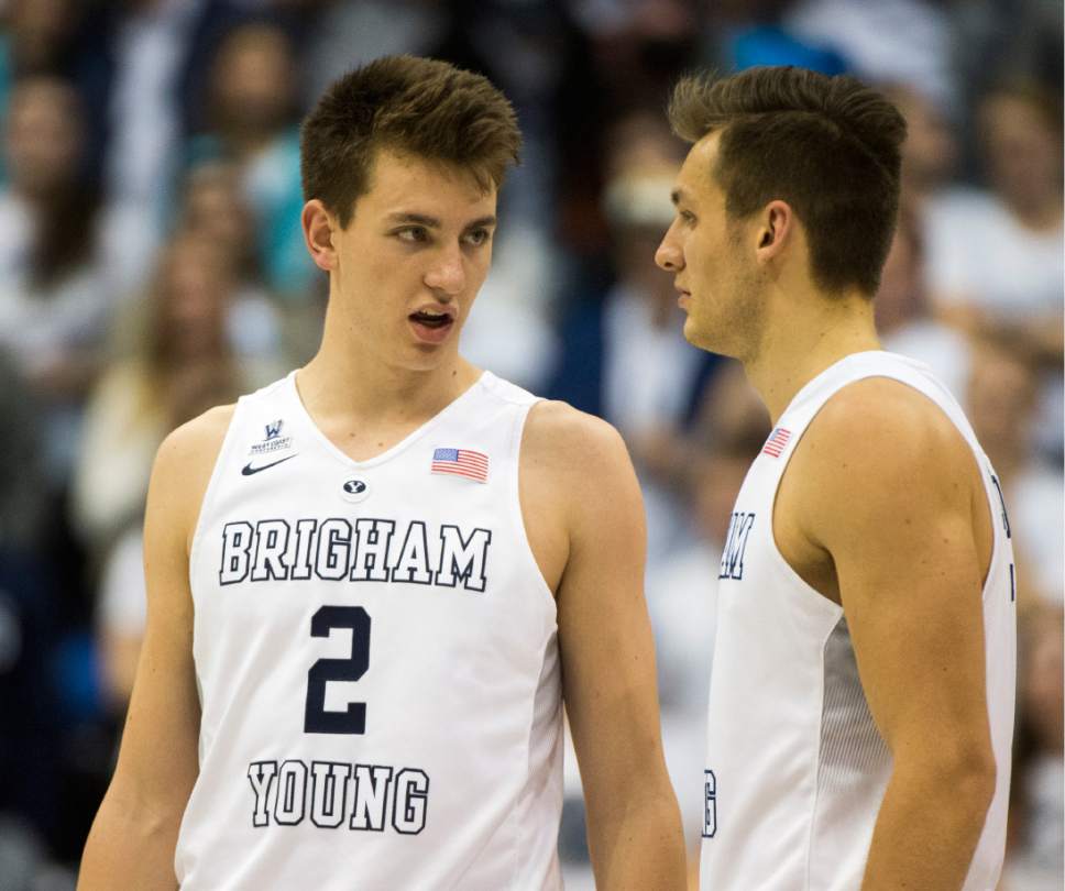 Rick Egan  |  The Salt Lake Tribune

Brigham Young Cougars guard Zac Seljaas (2) chats with Brigham Young Cougars guard Kyle Collinsworth (5) during a break, in basketball action BYU vs. San Francisco, at the Marriott Center, Saturday, January 9, 2015.