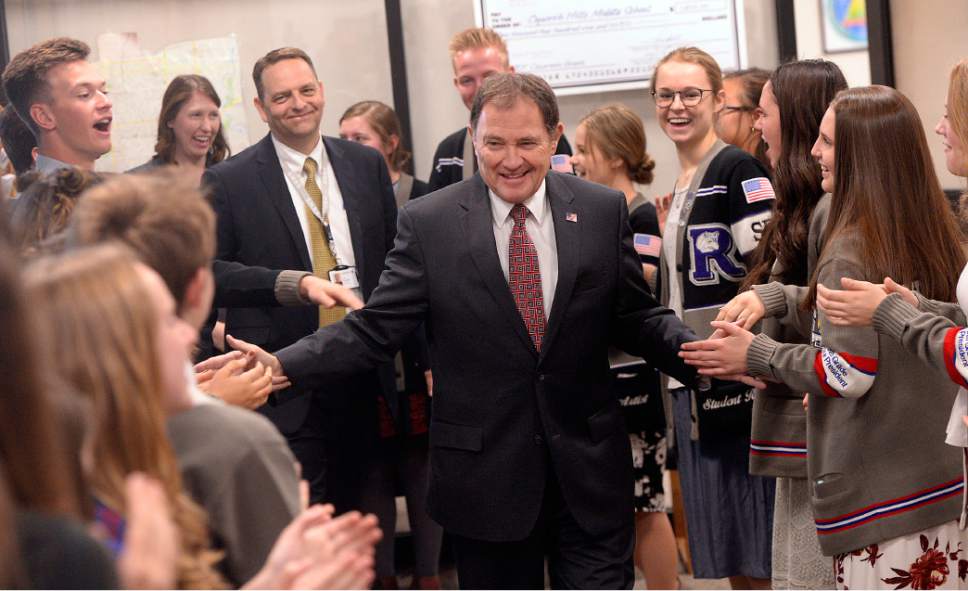 Al Hartmann  |  The Salt Lake Tribune
Gov. Gary Herbert gets a warm welcome from student body officers at Oquirrh Hills Middle School in Riverton Wednesday March 29 where he signed a series of education bills passed by this year's legislative session.