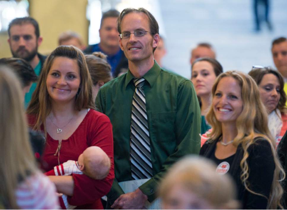 Steve Griffin  |  The Salt Lake Tribune


Lillian Swapp Foster, holds her six-week-old son Adonijah Foster, left,  and Catrina Foster, right, stand with their husband Enoch Foster as they attend a protest rally against H.B. 281 that if passed make polygamy a felony in Utah again. The Fosters, of southeast Utah and other members of Utah's plural marriage community rallied against the bill in the Capitol rotunda during the 2016 legislative session in Salt Lake City, Monday, March 7, 2016.