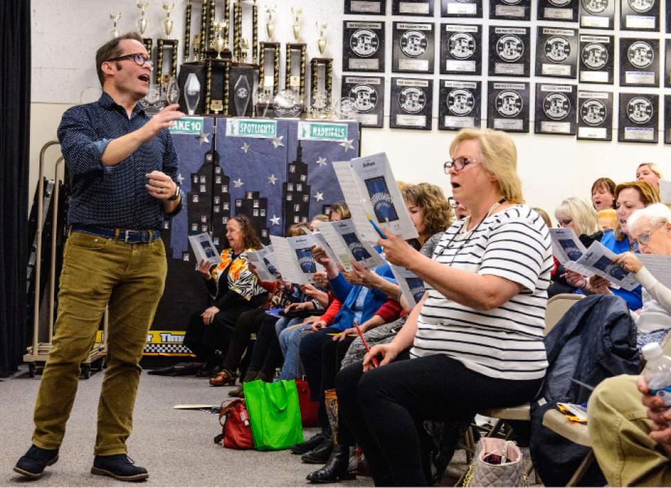 Steve Griffin  |  The Salt Lake Tribune


West Jordan High School vocal music teacher, Kelly DeHaan, conducts the community choir, Utah Voices, at the West Jordan school on Wednesday, March 8, 2017.