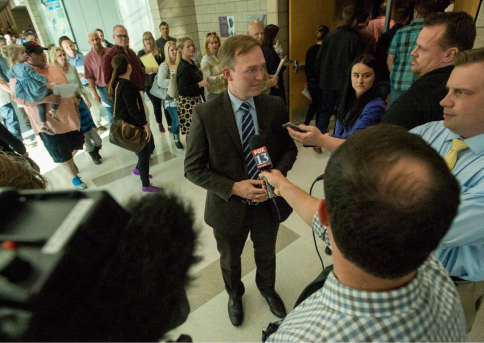 Rick Egan  |  The Salt Lake Tribune

Angry citizens heckle Salt lake County Mayor Ben McAdams as the enter the Draper Park Middle School auditorium, for an open house for two new potential homeless shelter sites in the Draper area, Wednesday, March 29, 2017.