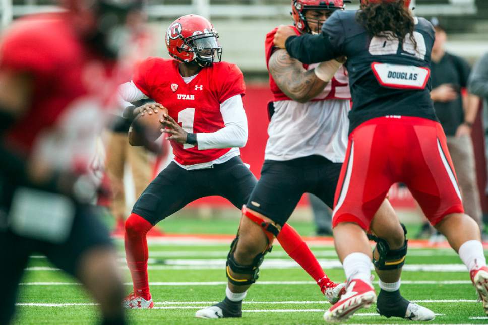 Chris Detrick  |  The Salt Lake Tribune
Utah Utes quarterback Tyler Huntley (1) during a scrimmage at Rice-Eccles Stadium Friday March 31, 2017.